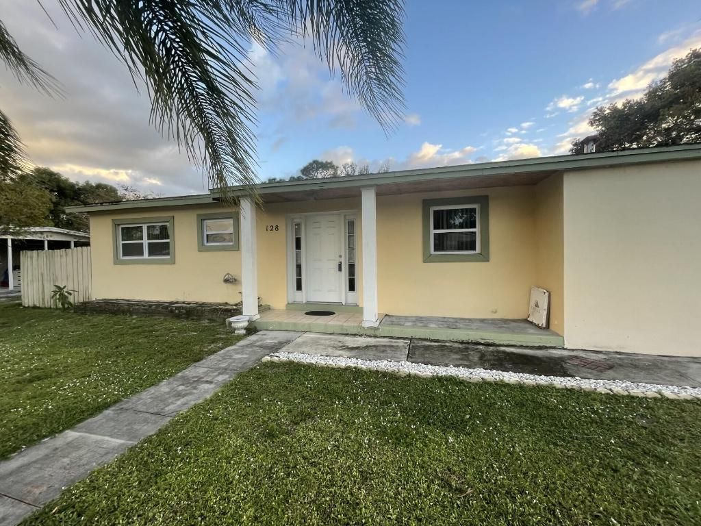 Photo of 128 SE Prima Vista Boulevard, Port Saint Lucie, FL 34983 (MLS # R10930318)
