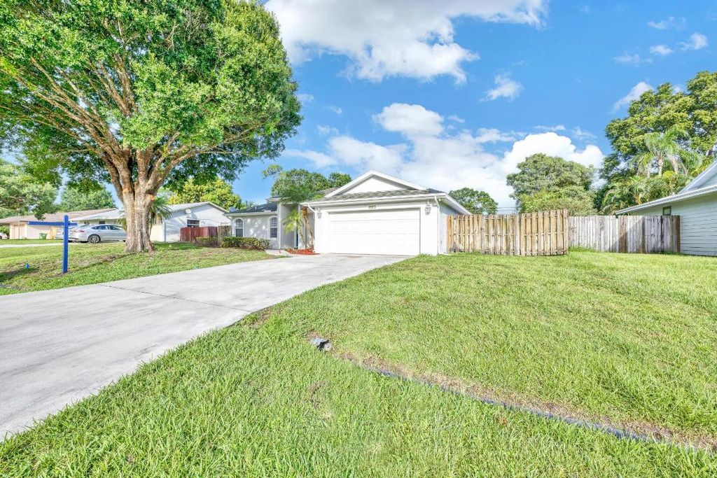 Photo of 1971 SW Hickock Terrace, Port Saint Lucie, FL 34953 (MLS # R10980053)