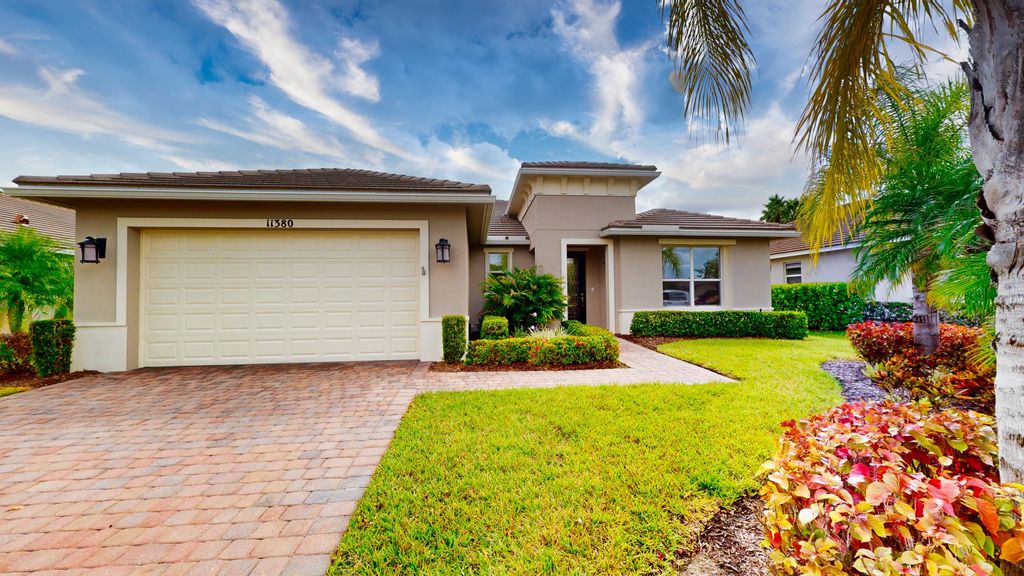 Photo of 11380 SW Apple Blossom Trail, Port Saint Lucie, FL 34987 (MLS # R10932231)