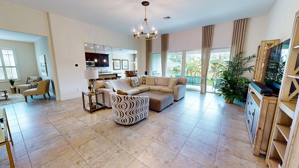 Photo of 11380 SW Apple Blossom Trail, Port Saint Lucie, FL 34987 (MLS # R10932231)