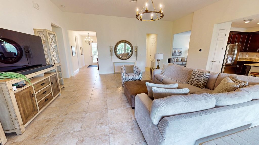 Photo of 11380 SW Apple Blossom Trail, Port Saint Lucie, FL 34987 (MLS # R10932231)