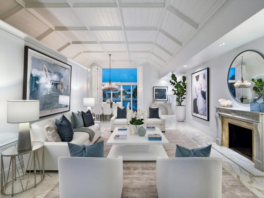 ''The Carpenter Estate'' on Royal Palm Yacht & Country Club's prestigious Intracoastal and sited on 2.5 lots with 261+/- feet of rare waterfrontage. A sprawling Hampton's Farmhouse-inspired design by Mizner/Fatio protege Byron Simonson Architect of Palm Beach in his signature style Circa 1964. Classical main house and separate guest/carriage house (1987) is timeless in every way. Truly an elegant and sophisticated Intracoastal estate for gracious entertaining. Resort-like pool, spa, large sun-drenched patio with pavilion and cabana. 4-bay garage in a private motor court. Shown by appointment to fully vetted buyers only.