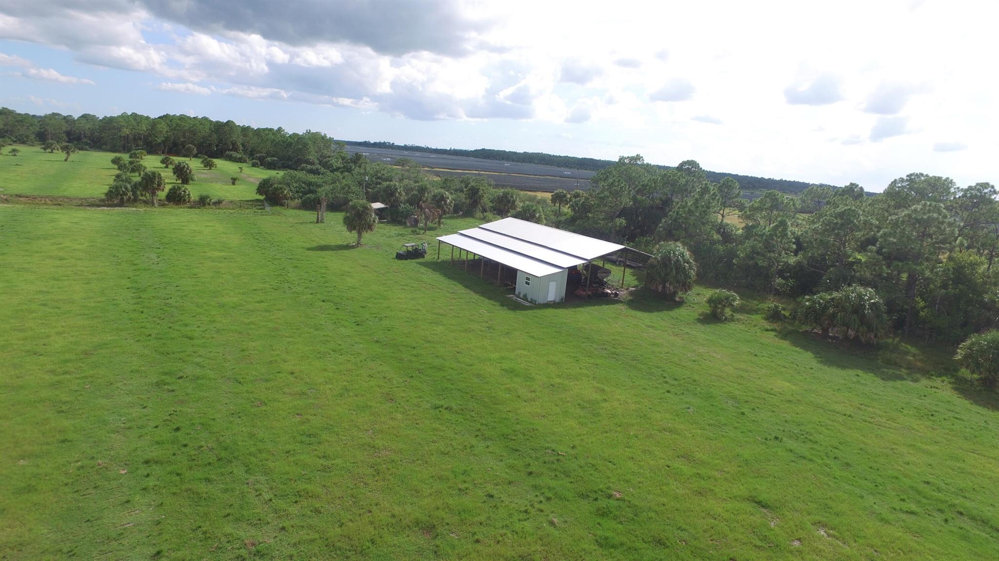 BEAUTIFUL, PEACEFUL, SERENE! 189 ACRES OF IMPROVED PASTURES PLANTED WITH TIFQUICK & TIFTON 9 BAHIA GRASSES. 5 FENCED GRAZING PASTURES EACH WITH CONCRETE WATER TROUGHS FED FROM THE ARTESIAN WELL. CATTLE LANE THE FULL LENGTH OF THE PASTURES. COZY CAMP HOUSE WITH KITCHEN AND BATHROOM BUILT IN 2020 WITH RO SYSTEM INSTALLED IN 2023. HUGE POLE BARN TO STORE ALL YOU EQUIPMENT! RV HOOK UP! NATURE AT ITS BEST! 54+ ACRES OF WOODLANDS BRINGS PLENTY OF WILDLIFE! PEACE AND SERENITY AT ITS BEST! 2 Parcels sold together