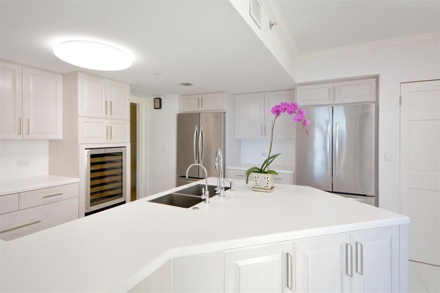 NEW LOOK & NEW PRICE! Completely renovated 4,000+ SF double-unit featuring a stunning master bedroom with multiple custom walk-in closets and impact glass, updated modern kitchen, wood floors in living area, recessed lighting & electric blinds throughout. Not to mention, this 4BD/4.5BA condo has private elevator entry on the 21st floor plus gorgeous unobstructed views of the Intracoastal waterway and Ocean. Trump Plaza now has a brand new updated fitness center in addition to 2 swimming pools, tennis courts, first-class concierge, and other amenities. This full service luxury building is one of the most sought after buildings along the Intracoastal.