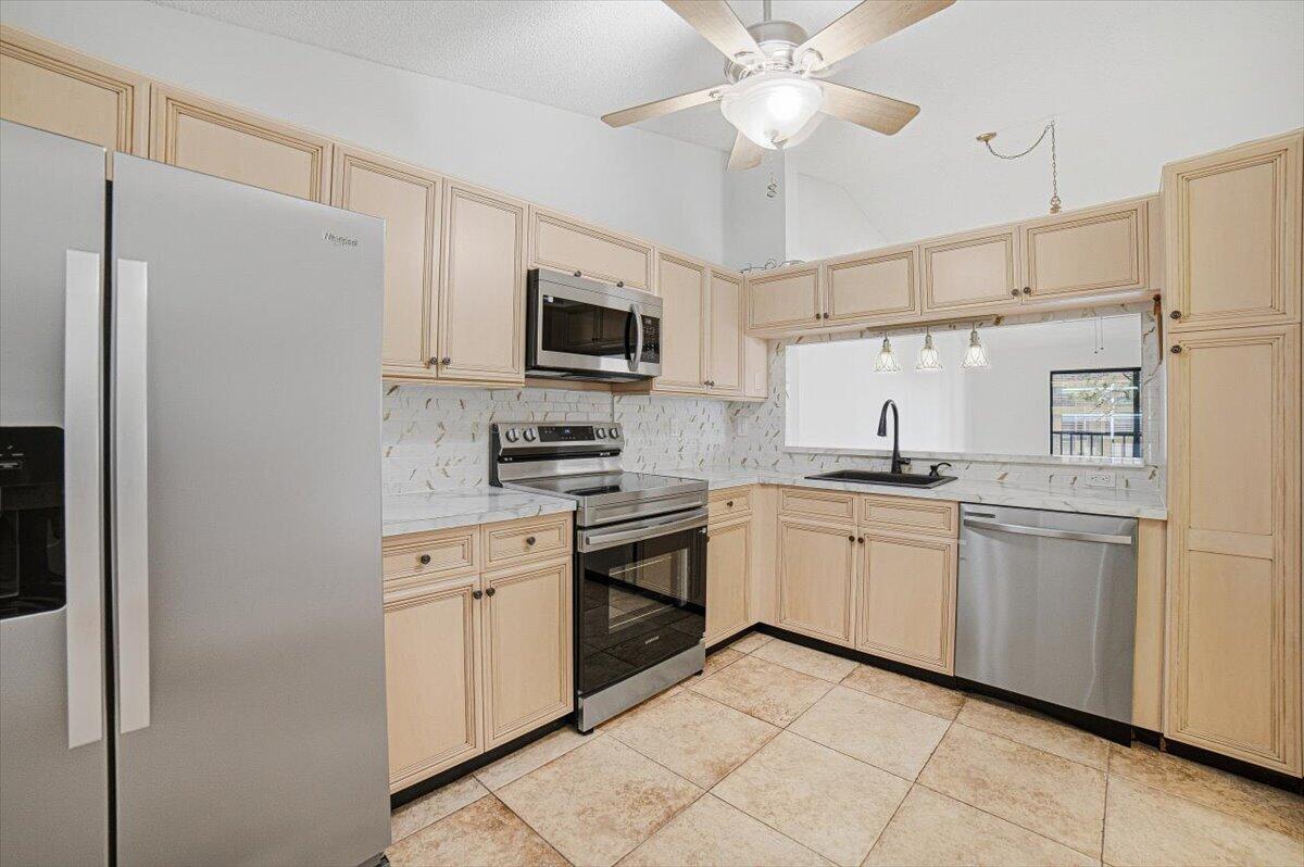 Properties 4880 LUCERNE LAKES Boulevard W 206