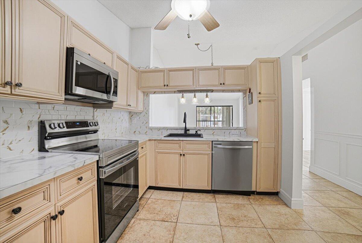 Properties 4880 LUCERNE LAKES Boulevard W 206