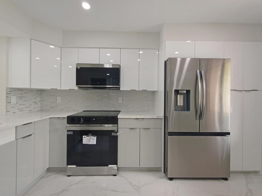 Photo of 7280 Amberly Lane #207, Delray Beach, FL 33446 (MLS # B26029641)
