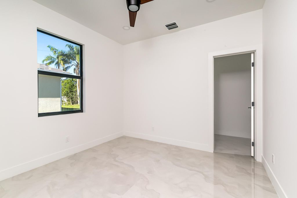 Photo of 5945 NW Foust Circle, Port Saint Lucie, FL 34986 (MLS # B26037990)