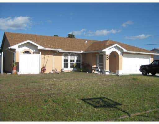 Photo of 1901 SE Dock Street, Port Saint Lucie, FL 34952 (MLS # B26038889)