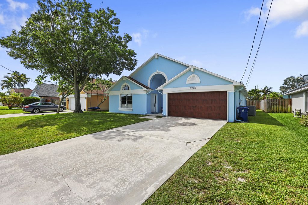 Photo of 6238 Pompano Street, Jupiter, FL 33458 (MLS # B26040127)