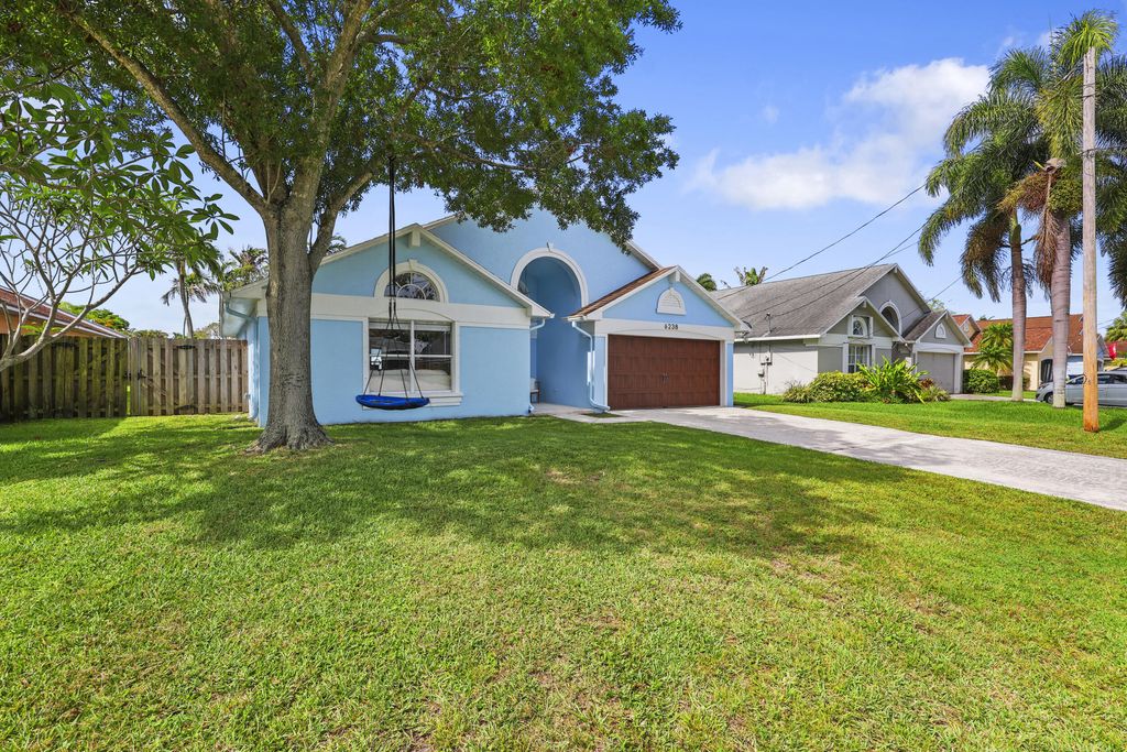 Photo of 6238 Pompano Street, Jupiter, FL 33458 (MLS # B26040127)