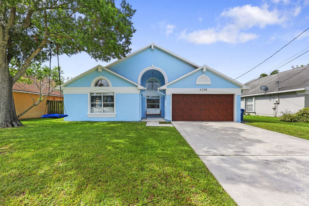 Photo of 6238 Pompano Street, Jupiter, FL 33458 (MLS # B26040127)