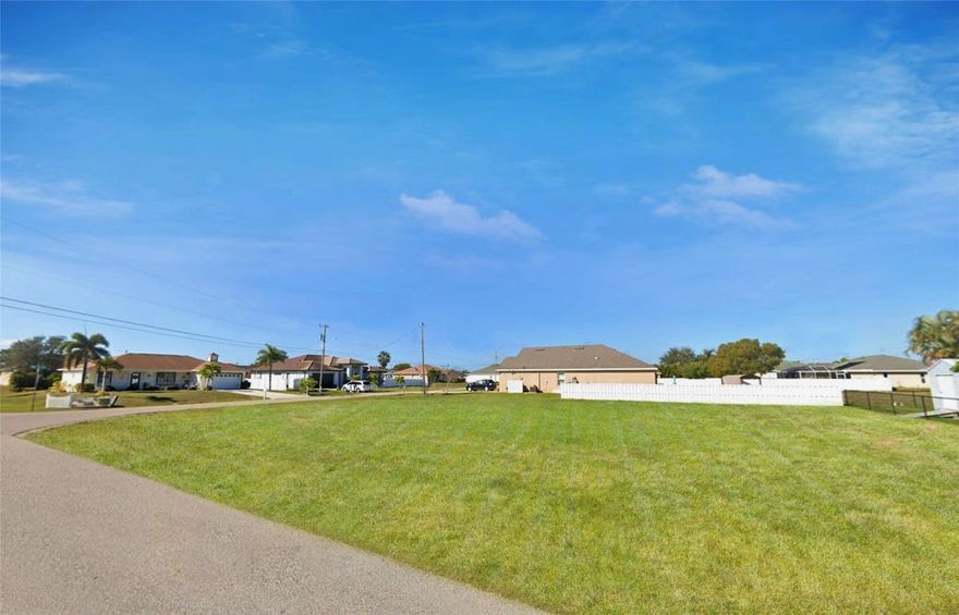 Stunning double corner lot, perfect for building your dream home, with all assessments paid off. Situated in SW Cape Coral, it offers convenient access to shops and restaurants.