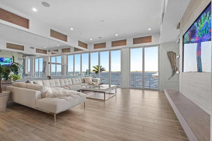 Discover the epitome of waterfront luxury in this stunning condo, boasting breathtaking river views and located in the vibrant heart of downtown Stuart. This exquisite property is a lifestyle choice for those seeking elegance and convenience. High-end finishes and custom wood cabinetry throughout, creating an ambiance of sophisticated comfort. State-of-the-art appliances, complemented by elegant quartz countertops. Each bedroom is an oasis of tranquility, with the bathrooms echoing the condo's overall luxury through refined design and fixtures. Enhance your waterfront lifestyle with the convenience of a private boat slip. The pool, complete with a BBQ and a fire pit, offers a perfect spot for entertaining or relaxing.