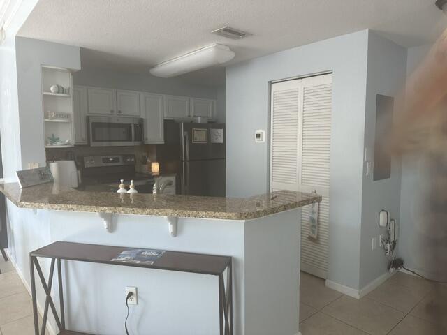 SOMERSET AT ABACOA CONDO - Residential