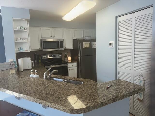 SOMERSET AT ABACOA CONDO - Residential