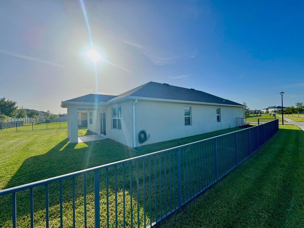 Photo of 10947 SW Tessili Way, Port Saint Lucie, FL 34987 (MLS # R11116565)