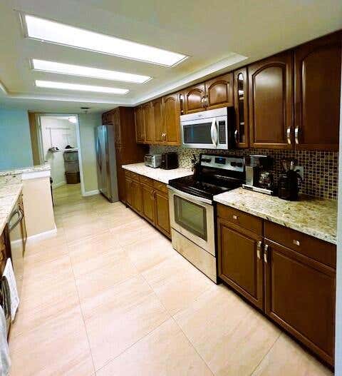 Photo of 2025 Lavers Circle #D410, Delray Beach, FL 33444 (MLS # R11130479)