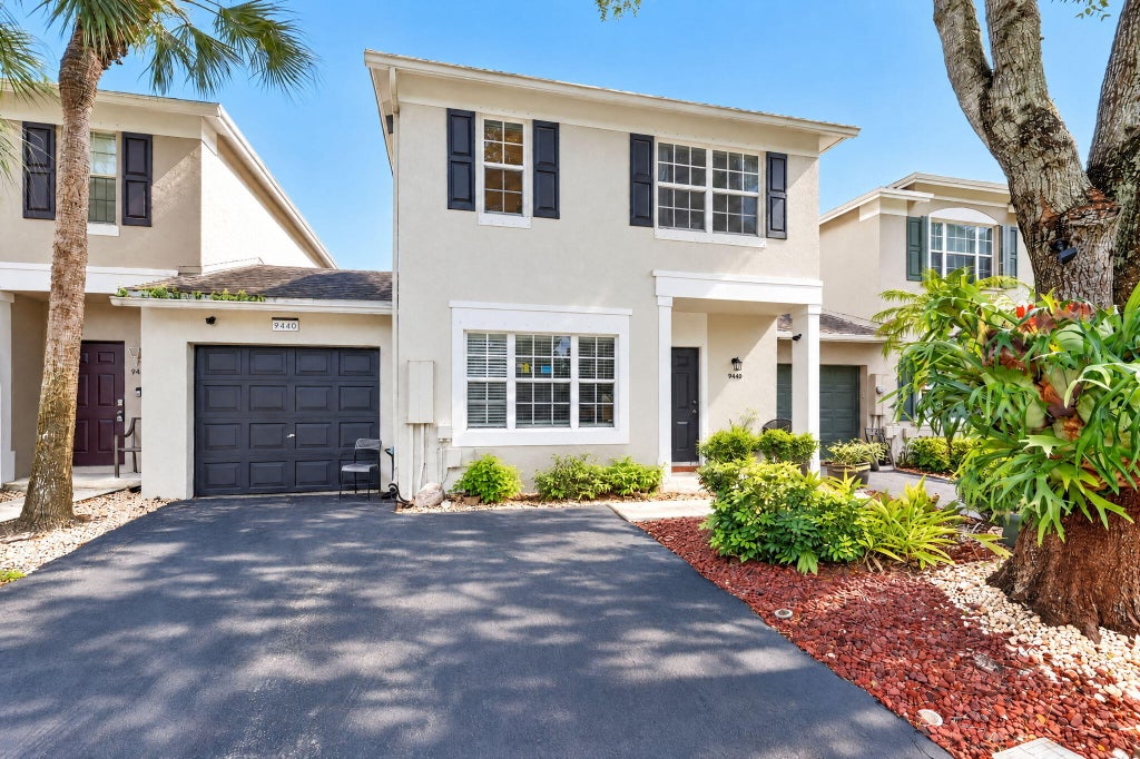 Photo of 9440 E PLUM HARBOR Way, Tamarac, FL 33321 (MLS # B26085864)