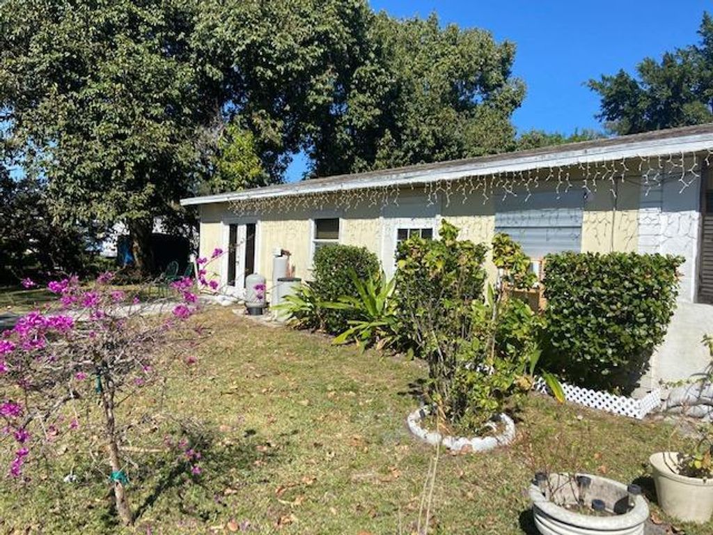 Photo of 5031 SE Kingfish Avenue SE, Stuart, FL 34997 (MLS # R10689419)