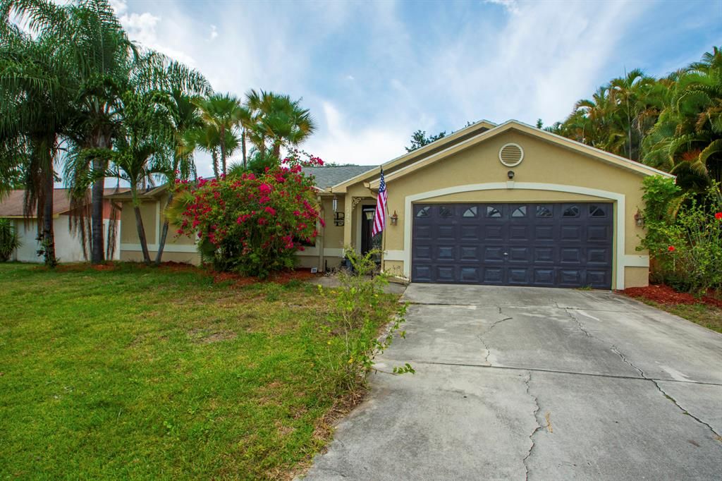 Photo of 725 SE Carnival Avenue, Port Saint Lucie, FL 34983 (MLS # R10715557)