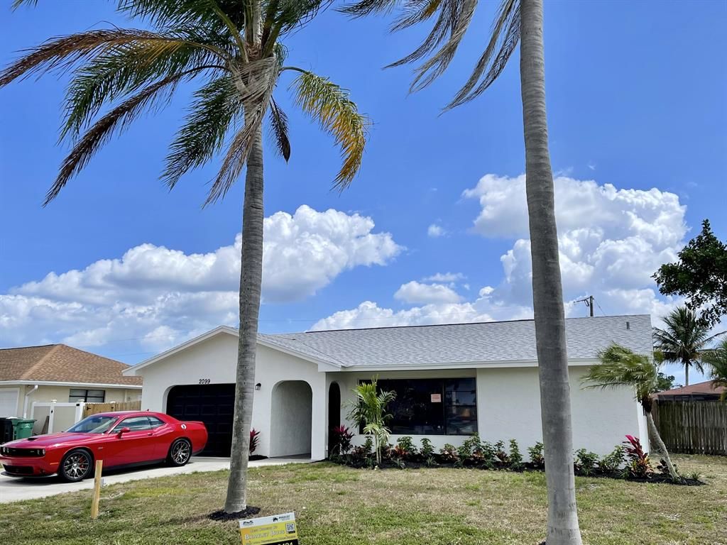 Photo of 2099 SE Esterbrook Street, Port Saint Lucie, FL 34983 (MLS # R10788414)