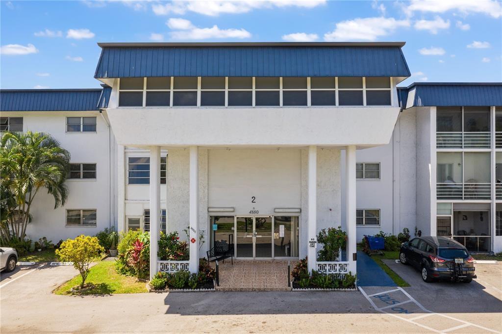 Welcome to this charming 960 sq. ft. 2/2 Corner Unit with extra light. Located in a vibrant 55+ community! This spacious unit offers endless potential—while original in style, it’s the perfect opportunity to make it your own. Enjoy peace of mind with hurricane-impact windows throughout. The community is rich with amenities designed for an active lifestyle, including activities, clubs, and events tailored for senior residents. Convenient shuttle and bus services make getting around a breeze, and you’ll love being centrally located near shopping, dining, and medical facilities. NEW ROOF 2023. Don’t miss this chance to create your dream space in a friendly, welcoming community!