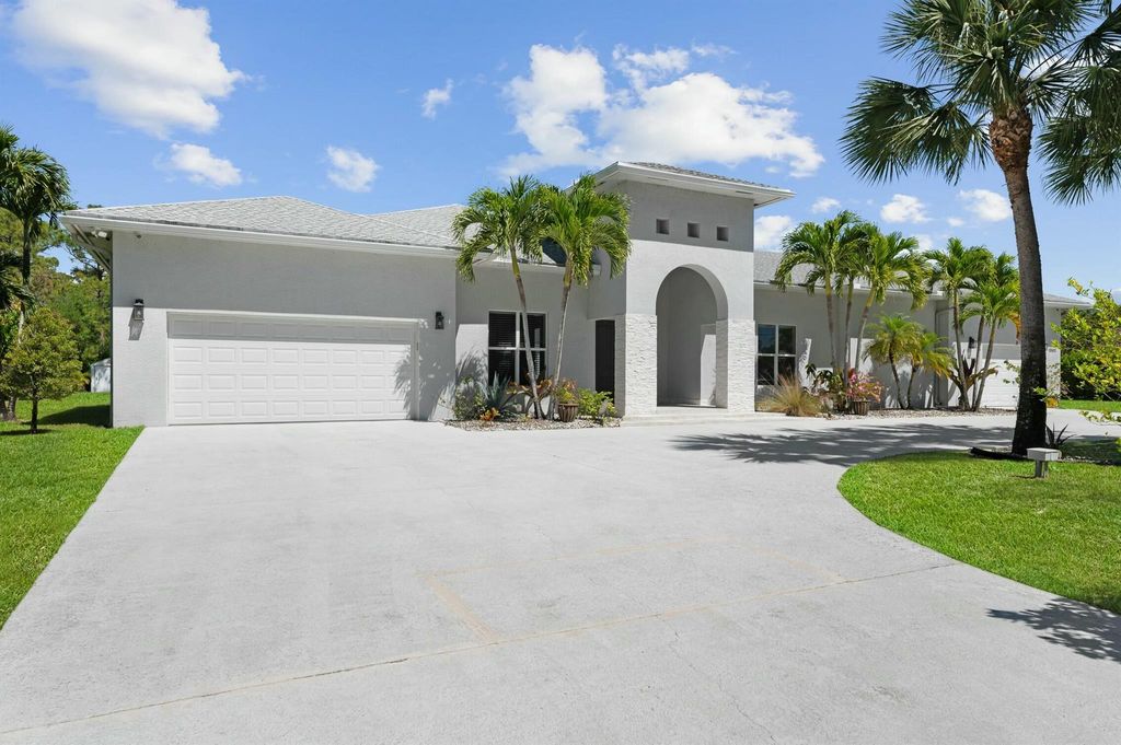 Photo of 15503 Temple Boulevard, Loxahatchee, FL 33470 (MLS # R11081957)