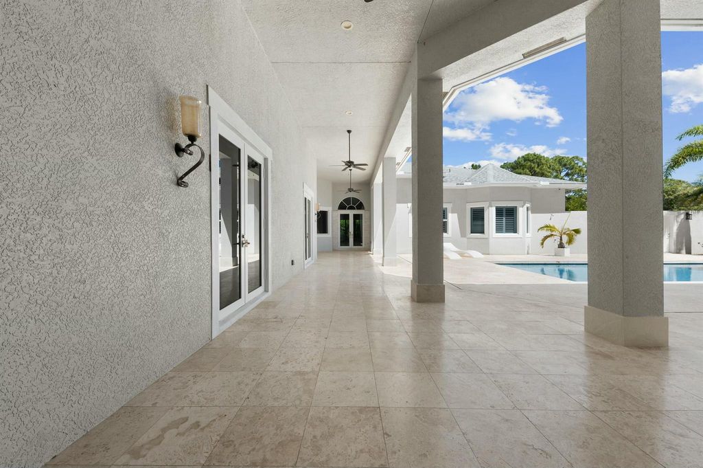 Photo of 15503 Temple Boulevard, Loxahatchee, FL 33470 (MLS # R11081957)