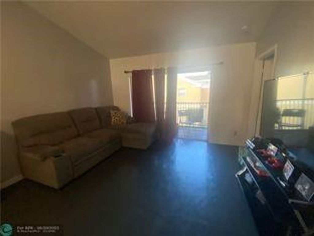 Photo of 2431 NW 56th Ave #204, Lauderhill, FL 33313 (MLS # F10538965)