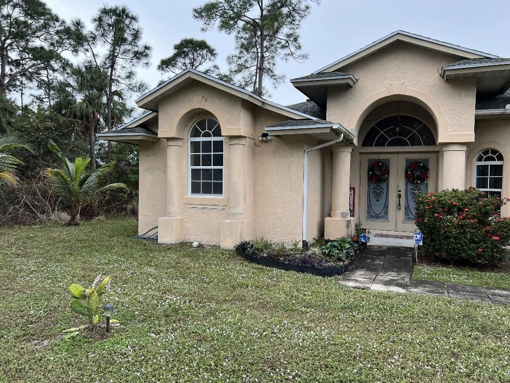 Photo of 1866 SW Lennox Street, Port Saint Lucie, FL 34953 (MLS # R10946656)