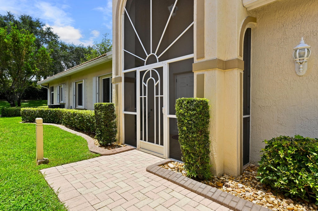 Photo of 9142 BAY POINT Circle, West Palm Beach, FL 33411 (MLS # B26071595)