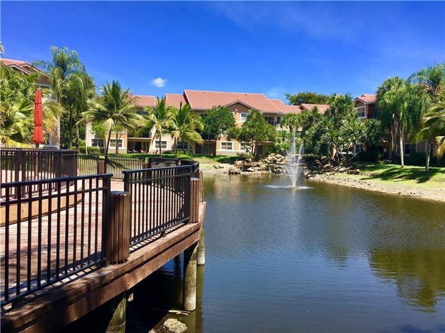 Come and live in this beautiful 2 bedroom and 2 bathroom apartment in the heart of Coral Springs!!! Located in the highly sought after community of Edgewater, close to mayor highways, shopping, dining and parks. This apartment has tile floor throughout, upgraded kitchen with granite top, large master bedroom with walk-in closet, washer and dryer, and a nice open balcony. This is a family-oriented community, where you can enjoy the clubhouse, 2 pools, gym, tennis court, playground, media room, billiards and more. Investors may purchase and rent right away. Schedule your showing today!