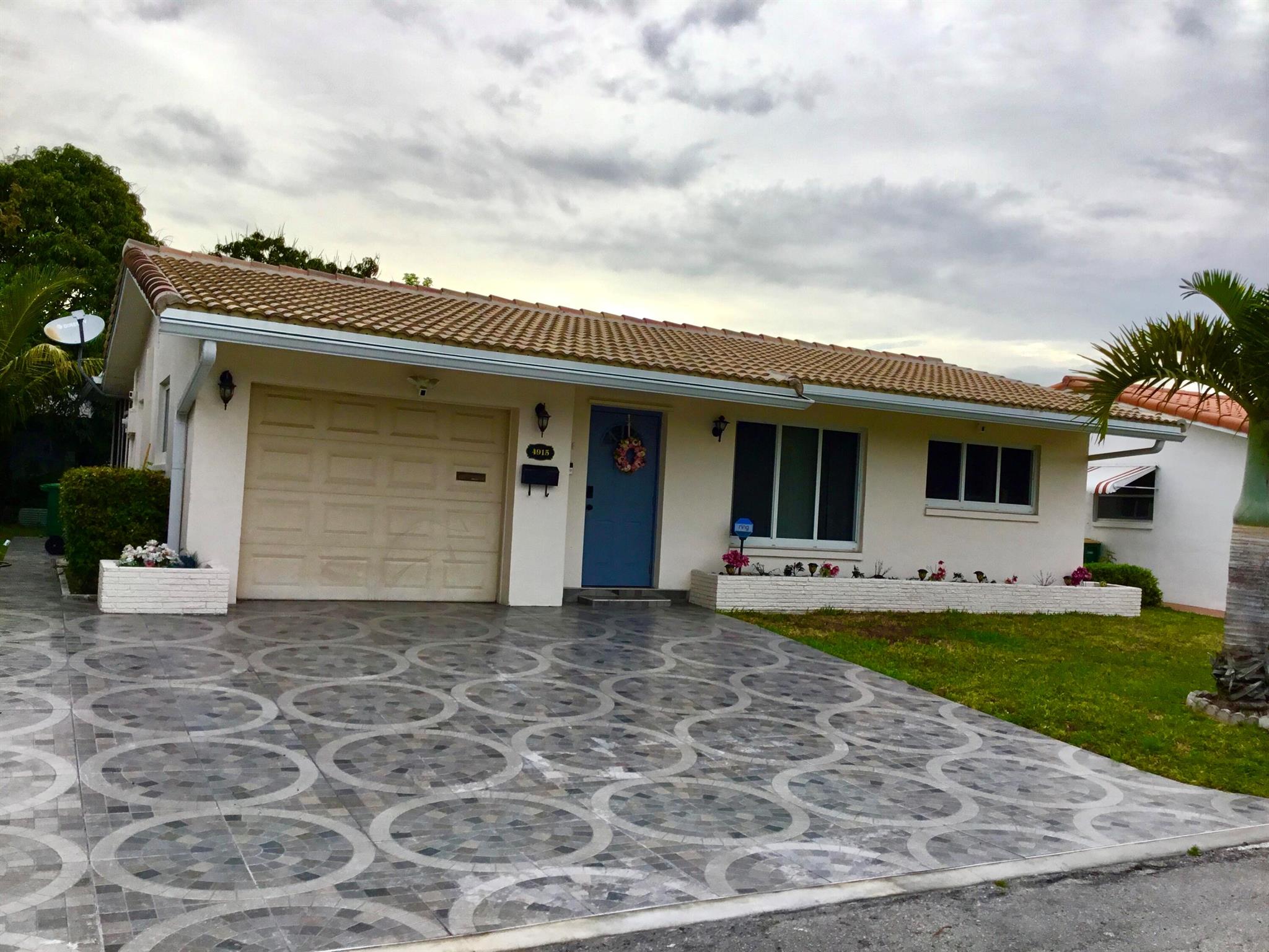 BEST PRICED'' charming single-family home in the Mainlands of Tamarac a 55+ Community. Features 2bedrooms, 2 bathrooms, an 1-car garage and a den .This residence features an updated kitchen and baths with beautiful granite counters, stainless steel appliances, and tiled floors throughout, along with a laundry area equipped with a full-size washer and dryer.The community offers a pool and clubhouse conveniently located nearby along with ample shopping and all major highways. Schedule your tour today!