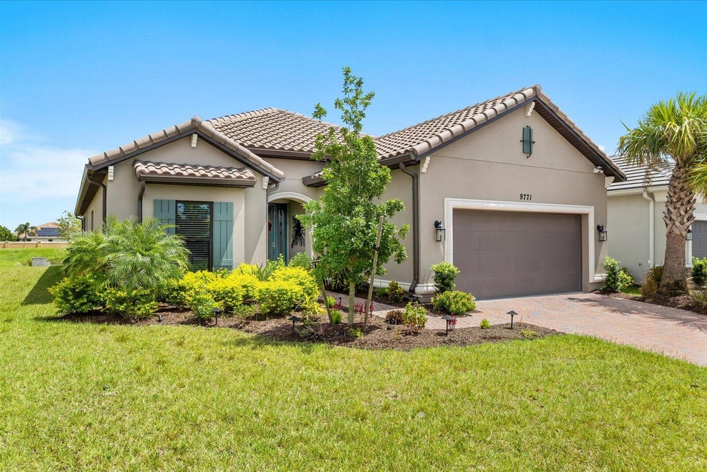 Photo of 9771 Santini Road, Port Saint Lucie, FL 34987 (MLS # B26076172)