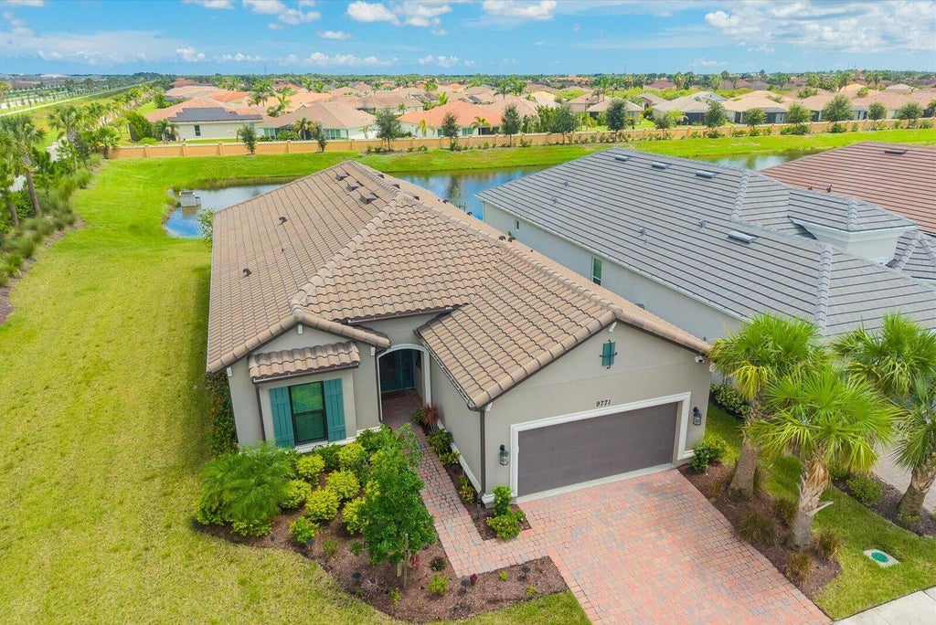 Photo of 9771 Santini Road, Port Saint Lucie, FL 34987 (MLS # B26076172)
