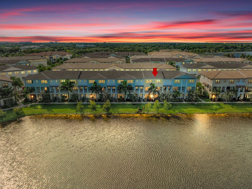 This stunning 3 BR / 3.5 BA townhome in Alton offers 2,252 sq ft of modern luxury, open-concept design, one of the best locations and lake views in the community. Built in 2022 with complete  impact windows, a 2-car garage, and designer finishes throughout. The gourmet kitchen features a gas cooktop, large island, and custom cabinetry. Primary suite with dual walk-ins, and a peaceful covered lanai overlooking the lake. Enjoy resort-style amenities including pool, gym, pickleball, playground, and more. All just minutes from beaches, dining, and shopping in the heart of Palm Beach Gardens. Move-in ready and motivated seller!