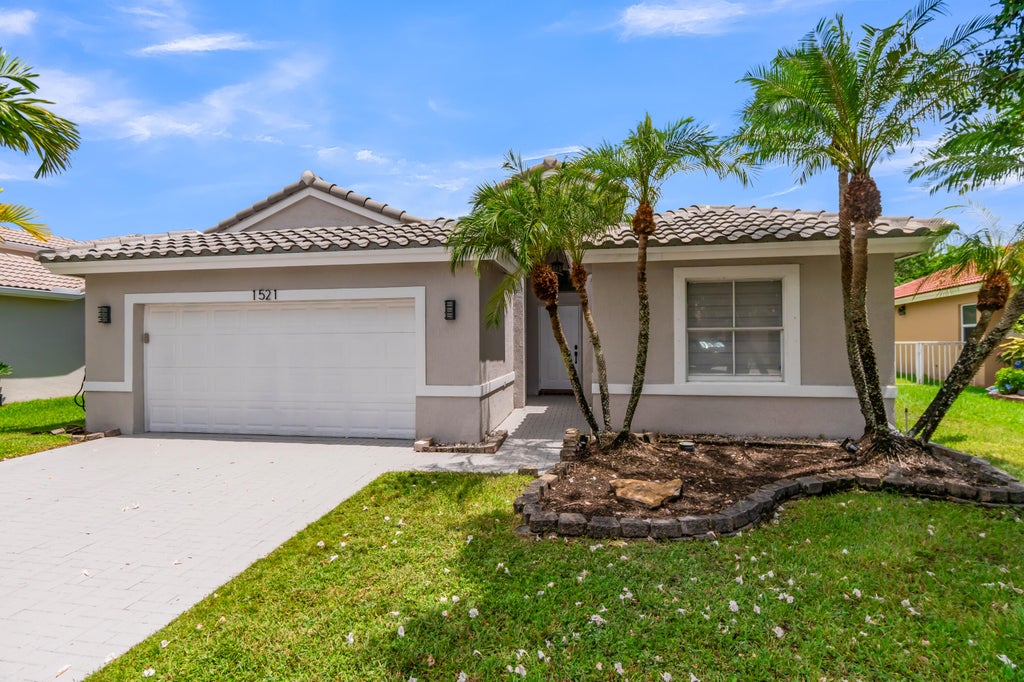 Photo of 1521 SW 186th Avenue, Pembroke Pines, FL 33029 (MLS # B26071404)