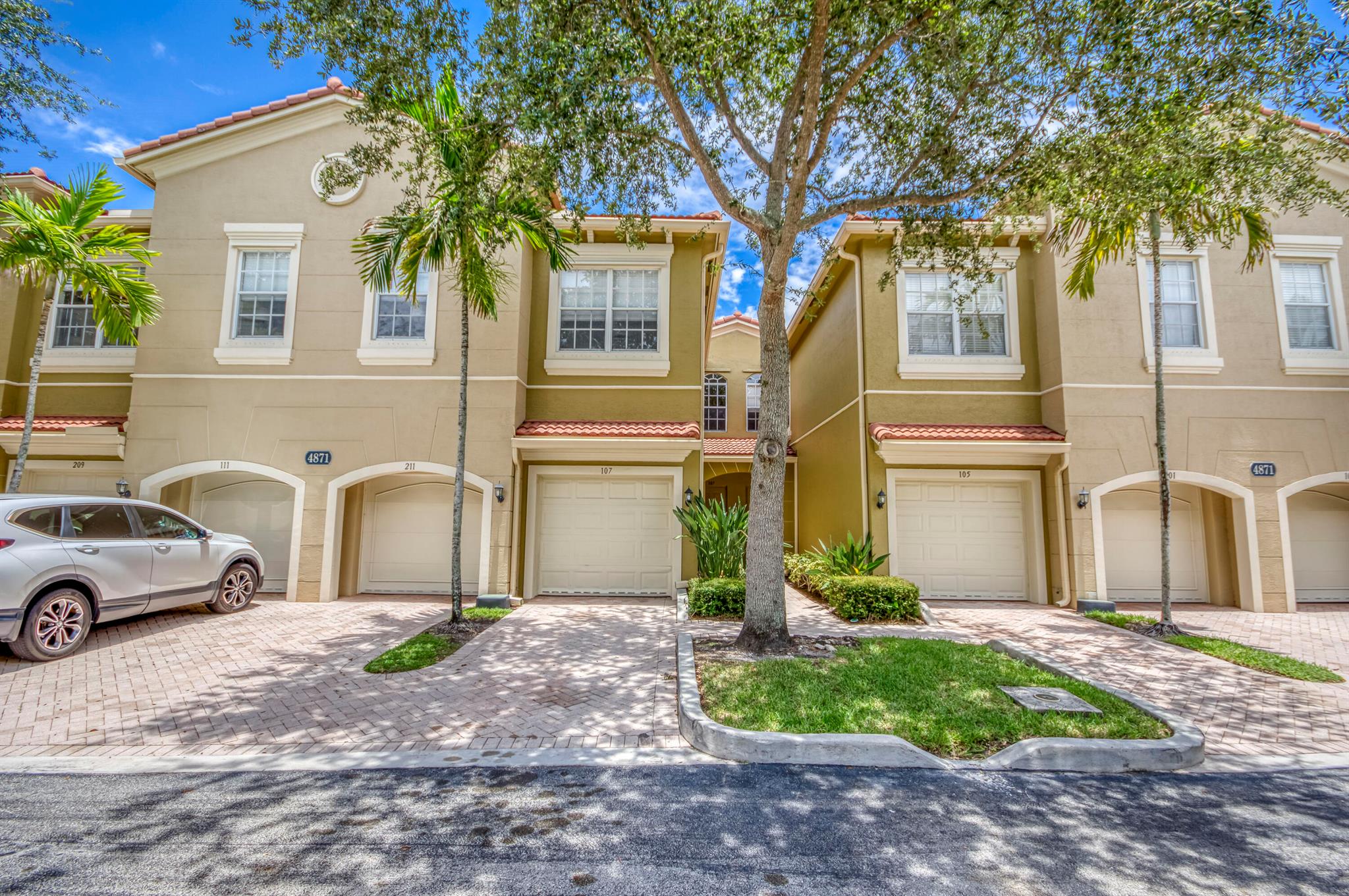 This beautiful 3-bedroom, 2.5-bath townhouse is located in a gated community and offers numerous upgrades throughout. The kitchen features stainless steel appliances and granite countertops, complemented by freshly painted interiors and newly added recessed lighting for a modern touch. The spacious family room is perfect for entertaining, while the primary bedroom easily fits a king-size bed and includes a large walk-in closet, abundant natural light, and a luxurious en-suite bathroom. Rustic wood-look porcelain tile floors run throughout the home, creating a warm, contemporary feel. Step outside to a private and spacious back patio, now featuring brand-new turf, ideal for relaxing or entertaining. Enjoy the peaceful sounds of birds from the nearby sanctuary as you unwind in this