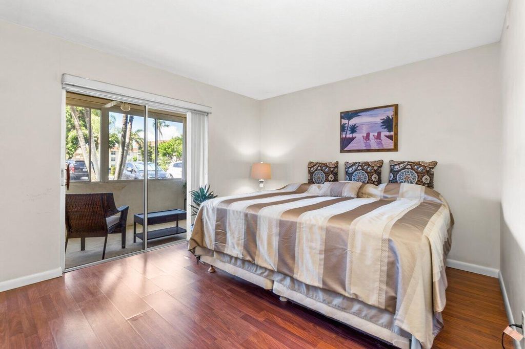 Photo of 5510 Tamberlane Circle #147, Palm Beach Gardens, FL 33418 (MLS # R10917805)