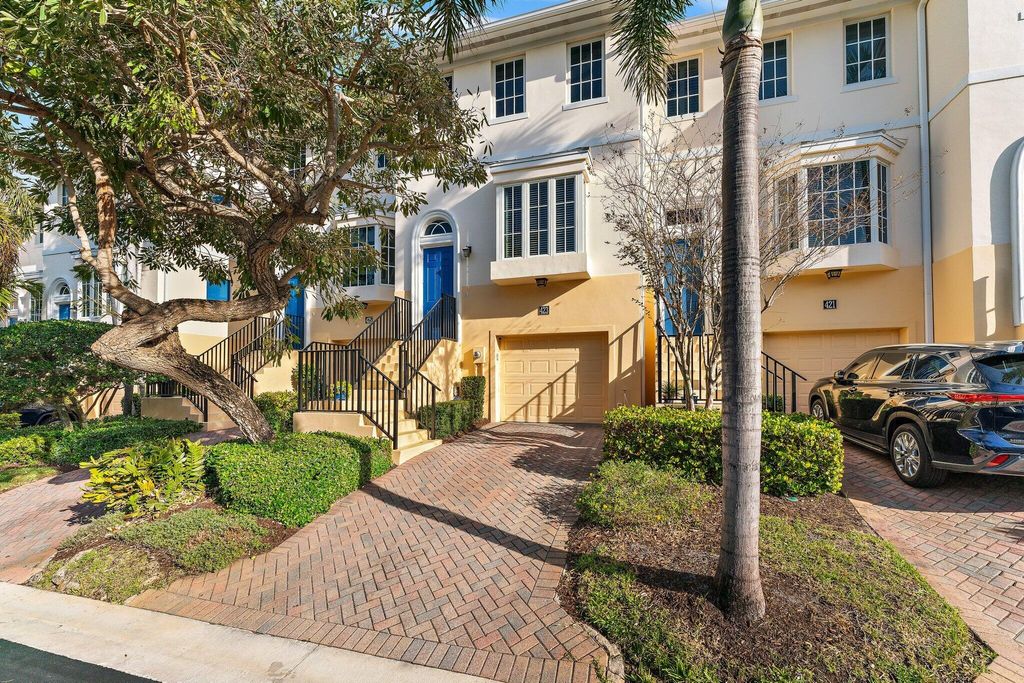 Photo of 423 Juno Dunes Way, Juno Beach, FL 33408 (MLS # R11046352)