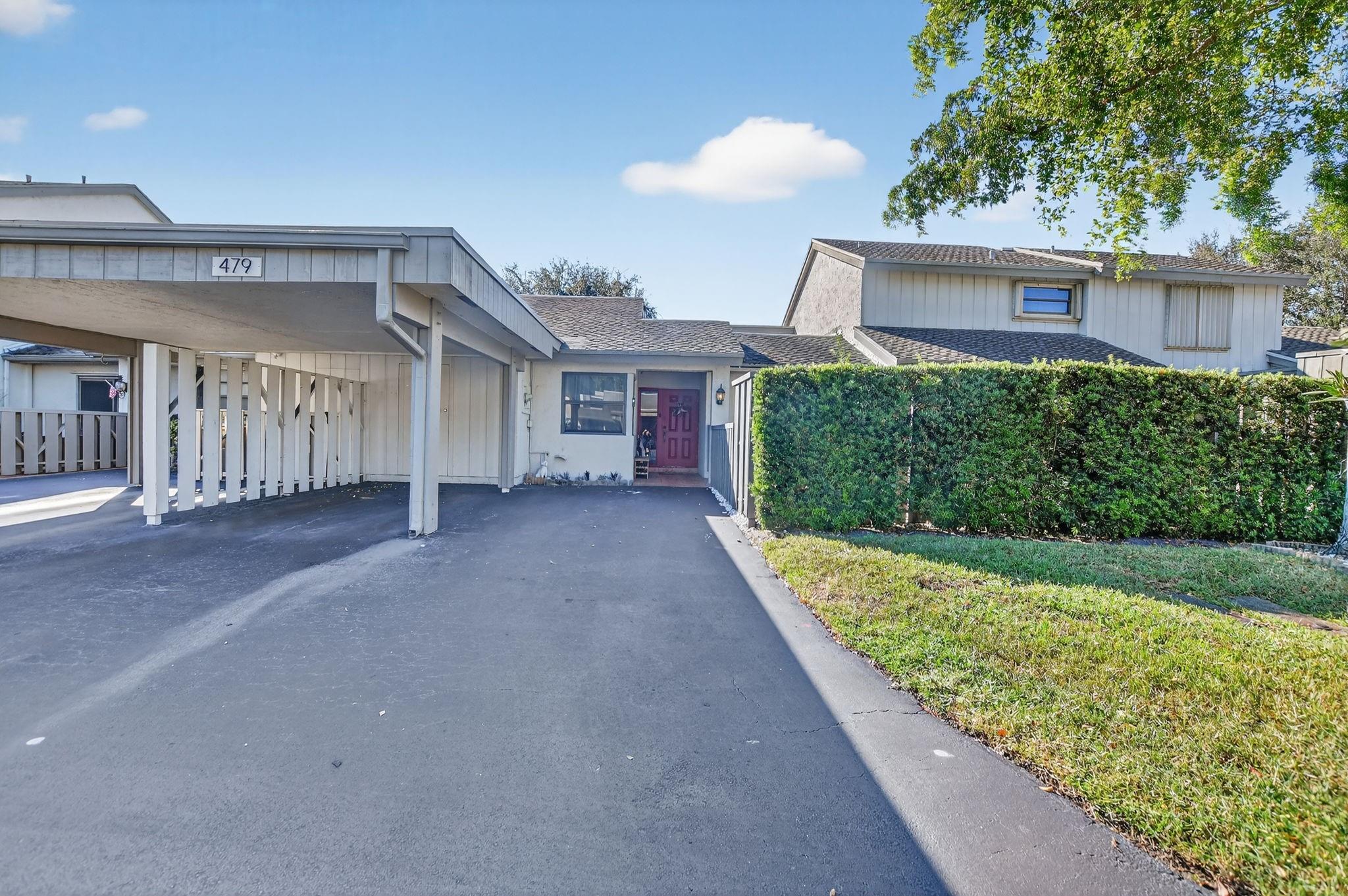 Spacious Villa with stunning view of Golf course! This large 2 bed 2 bath home is just off the 15th tee on the beautiful Deer Creek golf course. No mandatory club fees or membership, all ages community and super low $165 HOA that includes lawn care. Large partially fenced back yard with no pet restriction and room for pool. Open your 3 panel custom slider and feel the unencumbered space of golf course living with meticulously manicured rolling hills. Wake up and enjoy the peace of no back door neighbors. Deer Creek Golf club is home to a picturesque club house for golf, dining or socializing. Close to major highways for recreation and shopping this home features new impact windows, vaulted ceilings, open concept, and new flat roof.