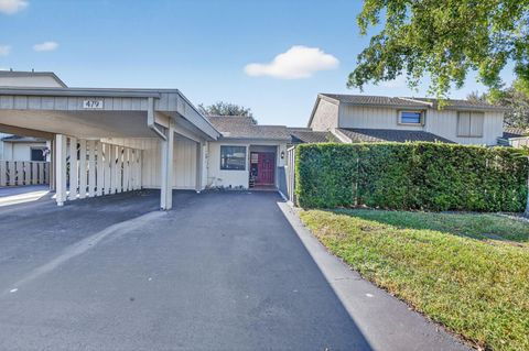 Photo of 479 Deer Creek Wildwood Lane E, Deerfield Beach, FL 33442 (MLS # F10533383) Photo of 479 Deer Creek Wildwood Lane E, Deerfield Beach, FL 33442 (MLS # F10533383)