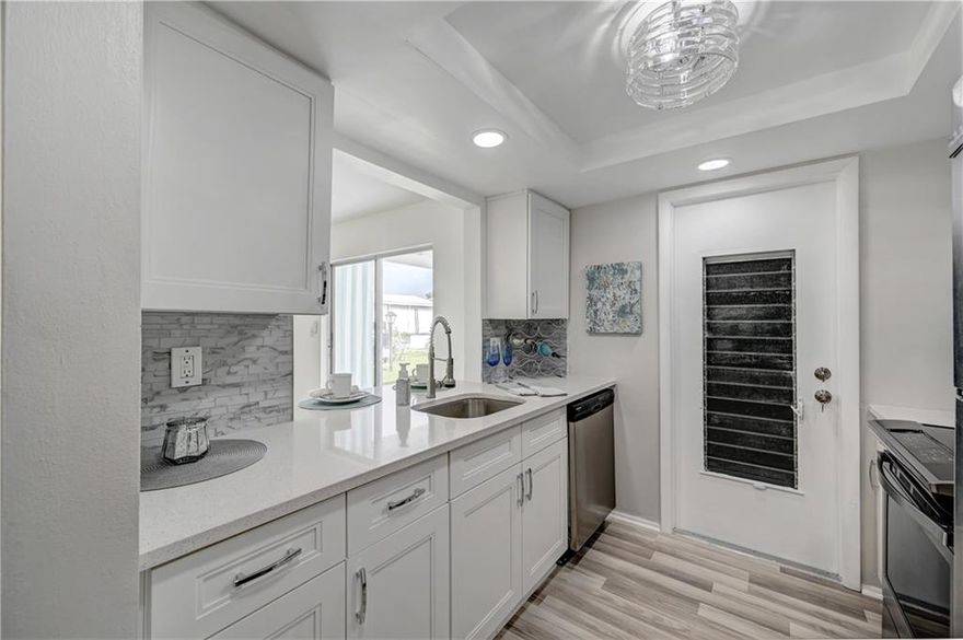 REDUCED! Welcome home to this completely remodeled single family home in the 55+ Leisureville community! This freshly painted 2/1 home features: New 2019 A/C system, electrical panel & water heater, hurricane awnings, new laminate floors thru-out, all new light fixtures, full size W/D, updated kitchen w/SS appliances & Quartz counters, updated bathroom, walk-in closet in master, covered patio & 1 car garage. Endless possibilities to add another bathroom and possible 2 bedrooms. This active senior living community offers 2 heated pools, 2 clubhouses, sauna, 9-hole golf course, bocce ball, shuffleboard courts & courtesy bus for residents. Pet friendly! Low HOA fee covers WATER, lawn care, pressure cleaning roof every 2 years & pressure cleaning/painting house every fourth year. NO LAND LEASE Welcome home to this completely remodeled single family home in the 55+ Leisureville community! This freshly painted 2/1 home features: New 2019 A/C system, electrical panel & water heater, hurricane awnings, new laminate floors throughout, all new light fixtures, full size washer/dryer, updated kitchen with Stainless Steel appliances & Quartz counters, updated bathroom, walk-in closet in master, covered patio and 1 car garage.  Endless possibilities to add another bathroom and bedroom. This active senior living community offers 2 heated pools, 2 clubhouses, sauna, 9-hole golf course, bocce ball, shuffleboard courts & courtesy bus for residents. Low HOA fee covers WATER, lawn care, pressure cleaning roof every 2 years and pressure cleaning/painting house every fourth year. Pet friendly! Close to everything!  NO LAND LEASE