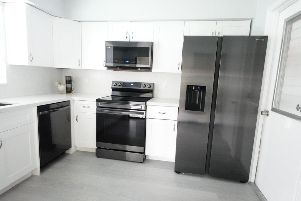 Photo of 9740 Pecan Tree Drive #A, Boynton Beach, FL 33436 (MLS # R11138603)