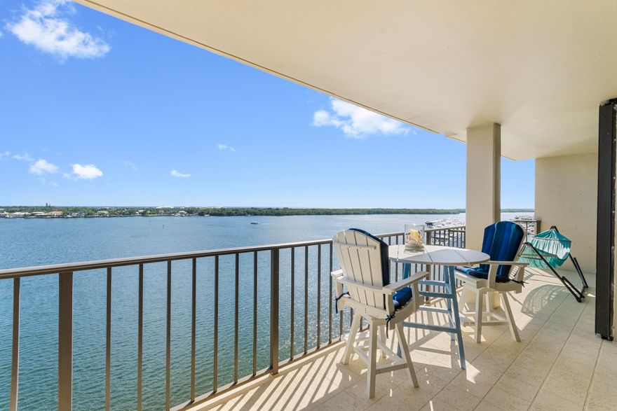 Beautifully renovated 2 bedroom and 2 bath North Palm Beach condo located in Old Port Cove. End Unit with amazing East Views of the Ocean, Intracoastal, and Marina. Open and updated kitchen with breakfast bar, granite counter-tops, white cabinetry, and stainless steel appliances. Updated wood tile flooring throughout. Large master suite with a walk-in closet and shower. Floor-to-ceiling sliding glass doors and windows. All windows have privacy shades. Plantation shutters on dining room window. Covered parking space, lots of guest parking. Enjoy the many amenities including a pool, fitness center, community room and library.  Old Port Cove is a premier waterfront community offering a 24-hour manned gatehouse, scenic waterfront walking path, Belle's Restaurant, and the Safe Harbor Old Port Cove Marina. Ideally located just minutes from shopping, dining, golf courses, and miles of beautiful beaches.