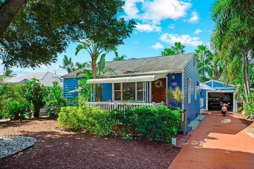 Twice featured in the Cottages of Lake Worth Tour, this is THE quintessential Lake Worth Beach cottage and you could be the next proud owner! This charming coastal cottage offers 2 bedrooms, 1 bathroom, and a spacious eat-in kitchen, but the real gem is the backyard! Step into a private tropical oasis with mature palms, hibiscus, and more. Enjoy the deck and gazebo--perfect for relaxing, entertaining, or watching sunsets. The home also has a detached one-car garage with plumbing and power, long driveway, covered porch, and a quiet location near downtown, the golf course, the beach, and PBI Airport.