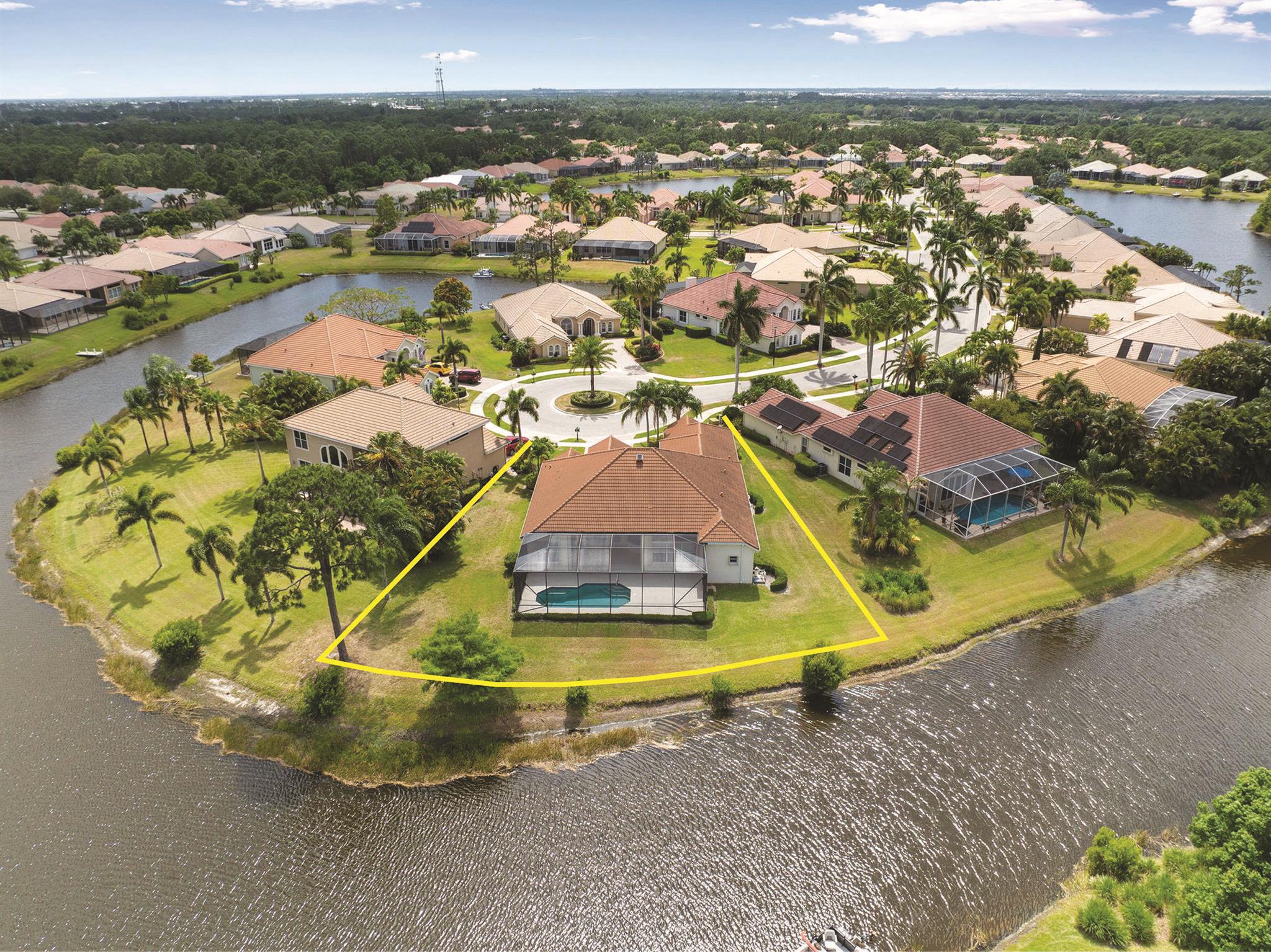 This immaculate home is located on a water surrounded cul-de-sac and has an exceptional wide lake view from the covered lanai as well as from the interior rooms. Screened pool & patio area has a convenient cabana bath with shower. A spacious central kitchen, wine bar with service counter and semi-open floor plan ensure entertaining ease. Well separated large bedrooms offer privacy to both residents and guests. Tile flooring in excellent condition throughout most of home. Two BRs have wood flooring; no carpet. 5 tons of zoned A/C (2016 & 2018) provide efficient dependable cooling. 2020 roof; 2024 natural gas W/H. New pool pump. Lake Charles has a manned security gate and is a highly sought after community in St Lucie West which offers numerous restaurants and outstanding shopping.