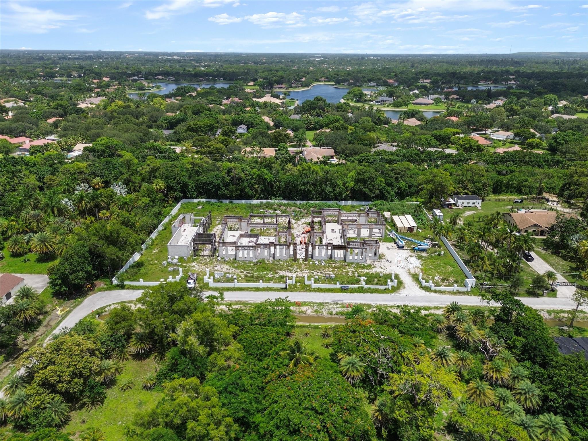 Build your dream estate on 2.22 acres in prestigious BBB Ranches, Parkland’s premier community. This luxury single-family residence, no-HOA & lot can accommodate 15,000+ sq ft of living area —main residence, guest house, detached garage, tennis court, pool, or equestrian setup. Beautifully configured floor plan, project already underway bring your interior designer to develop your interior blank canvas into a work of art!! Surrounded by privacy & mature trees, yet minutes from top-rated schools, parks, dining, & the Turnpike. A one-of-a-kind opportunity in one of Parkland’s most sought-after neighborhoods with endless potential for end-users or investors. Oversized lots like this are rarely available. Own one of the largest buildable lots in Parkland's private neighborhood.