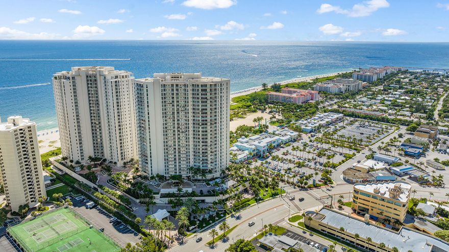 Defining and delivering the quintessential essence of sophisticated luxury resort living, this exceptional Ritz Carlton oceanfront condominium residence, with three bedrooms and 3,586 +/- total square feet, offers an exceptional opportunity. On a high floor of the prestigious Ritz Carlton's towers, etched glass double doors from the private elevator foyer introduce the elegant living room, which features built-in cabinetry for media and display as well as window walls of glass sliding doors that open to a wide balcony overlooking 180-views to the southeast of the ocean, Palm Beach island, the Intracoastal Waterway, Palm Beach Inlet and Peanut Island. The adjacent dining area and kitchen also share these magnificent views.
